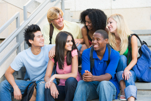 Happy students on college steps